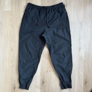 Jordan Black Windbreakers with Elastic Waistband and Tapered Fit